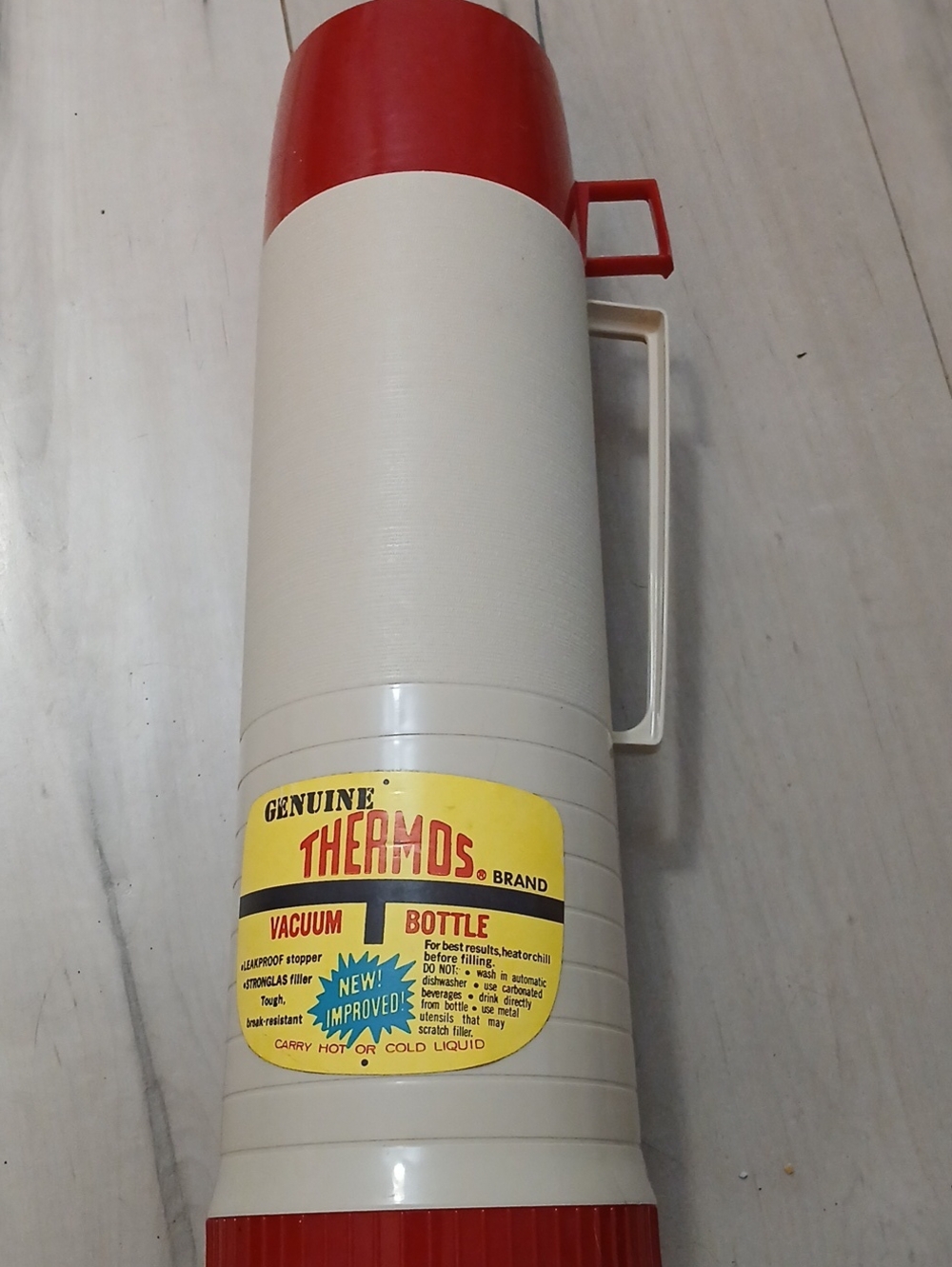 Thermos Red and Cream Vacuum Bottle with Handle